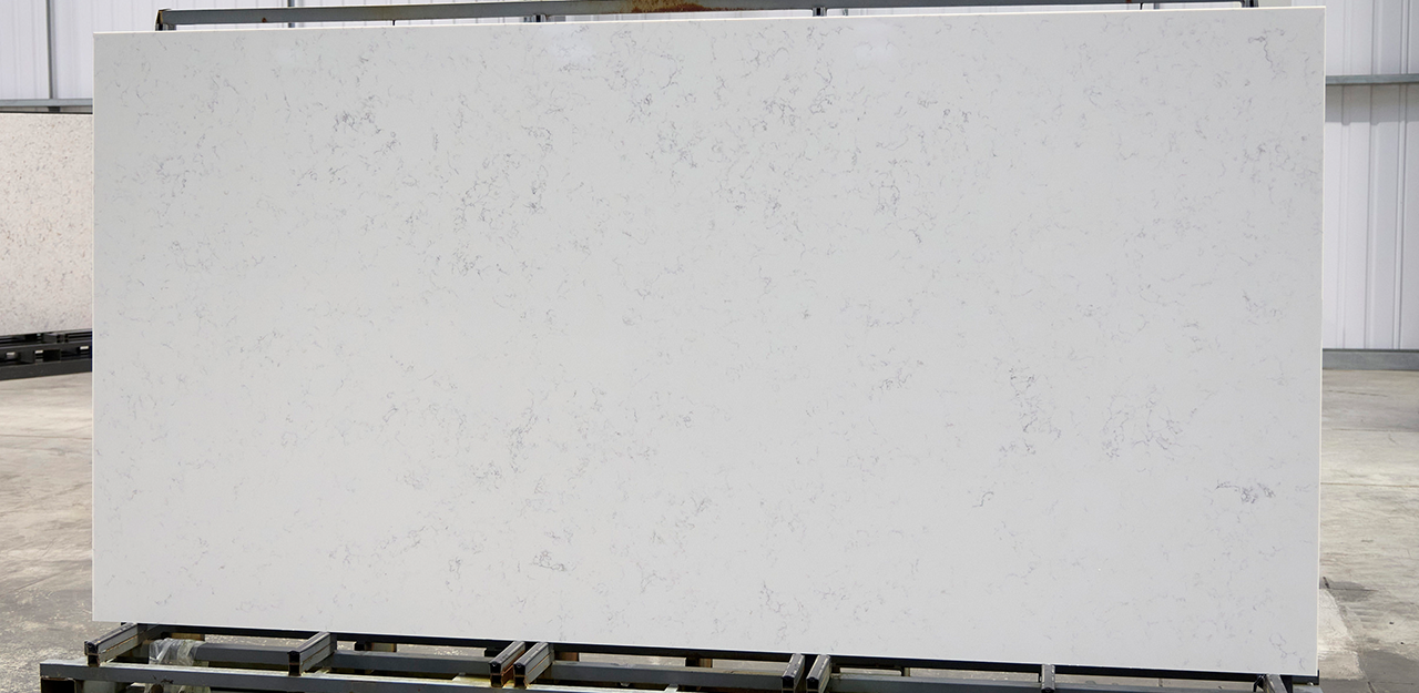 Full Slab view of Verona Quartz with a brown veins floating throughout
