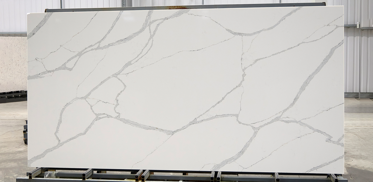 Full Slab view of Callacata Quartz with a whiter than most marbles and more pronounced veining.
