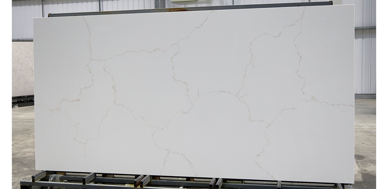 Full Slab view of Messina Gold Quartz with fine veining on a crisp white background