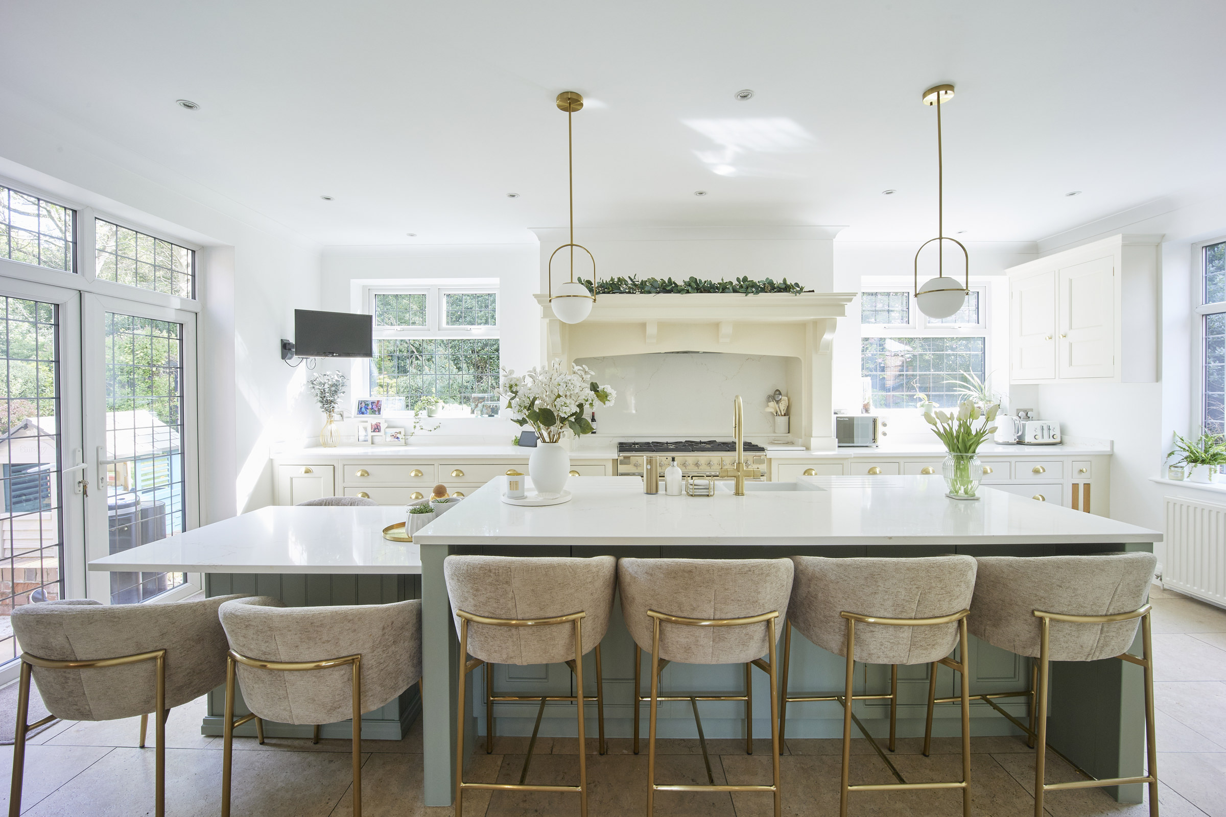 A contemporary kitchen designed with Messina Gold Quartz