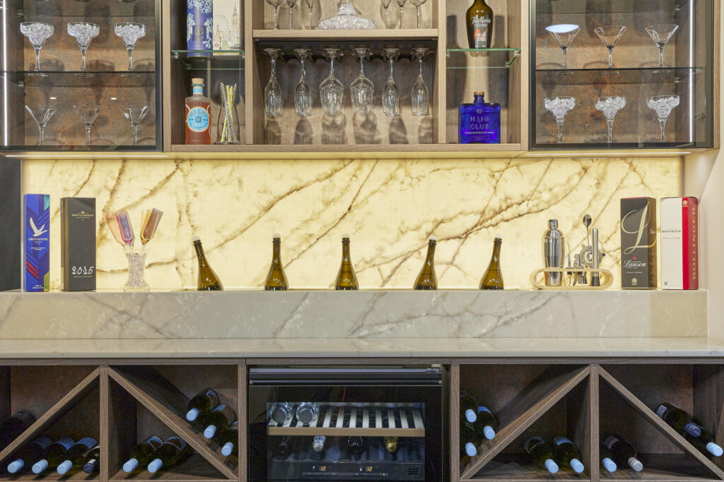 Backlighting Quartz Surface installed in a bar using Cristallo Perla