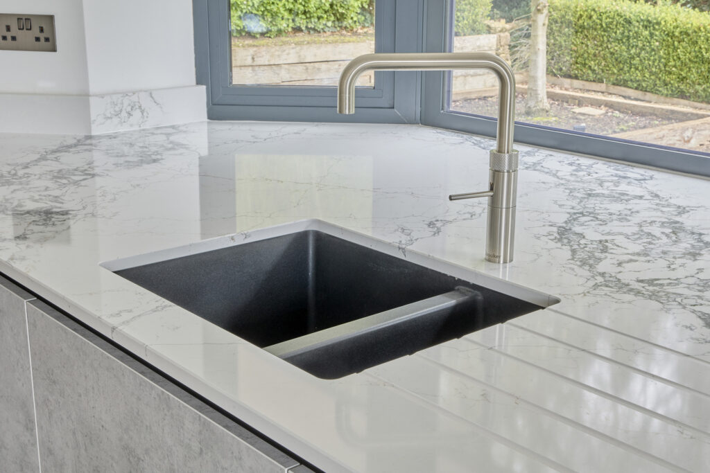 A kitchen Island with Pantheon Grey