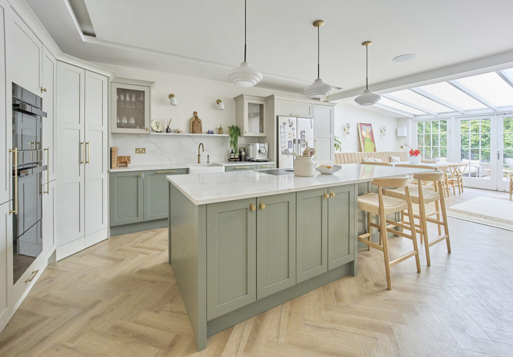 A kitchen Island with Quartz Modena