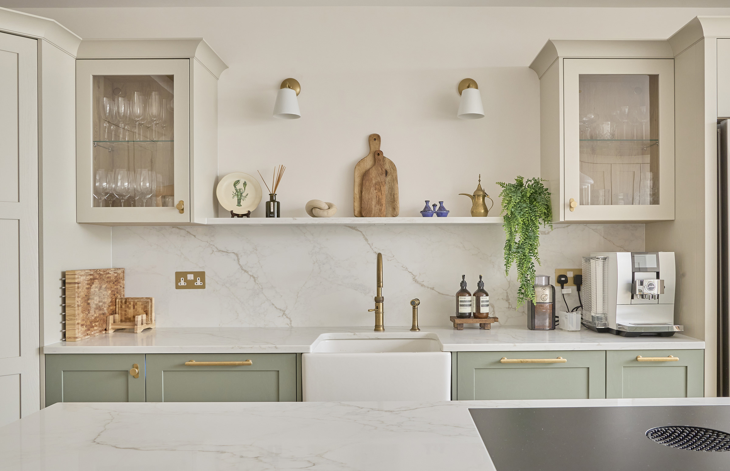 A kitchen Island with Quartz Modena