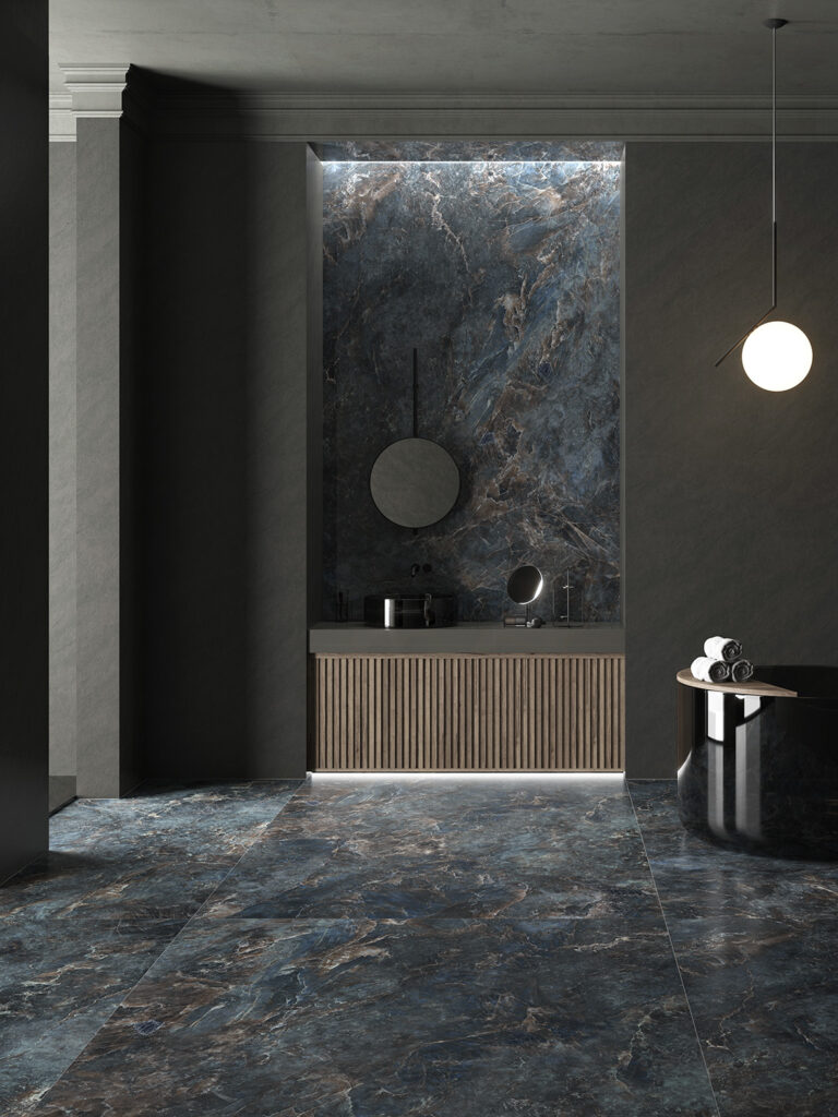 A bold, dark surface used for bathroom wall cladding and flooring.
